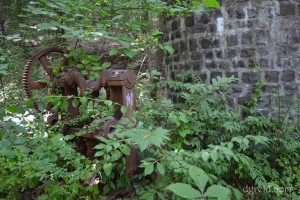 The remains of a pump and cistern that once brought water to the summit for visitors.